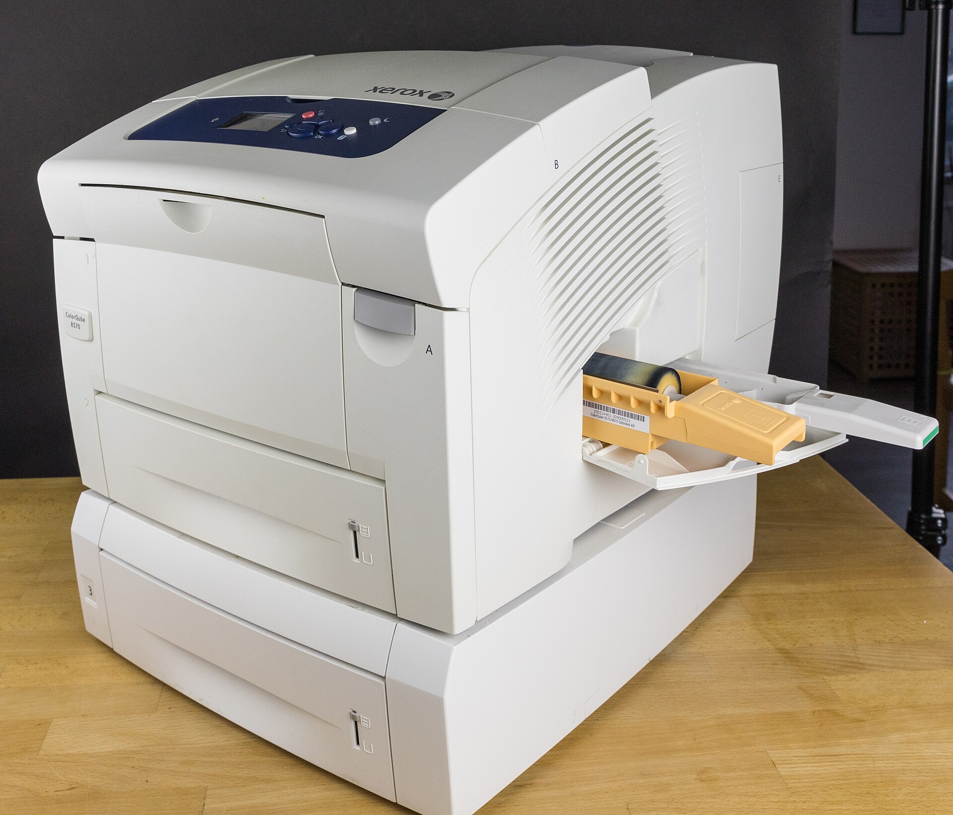 Color office printer with paper in the output tray
